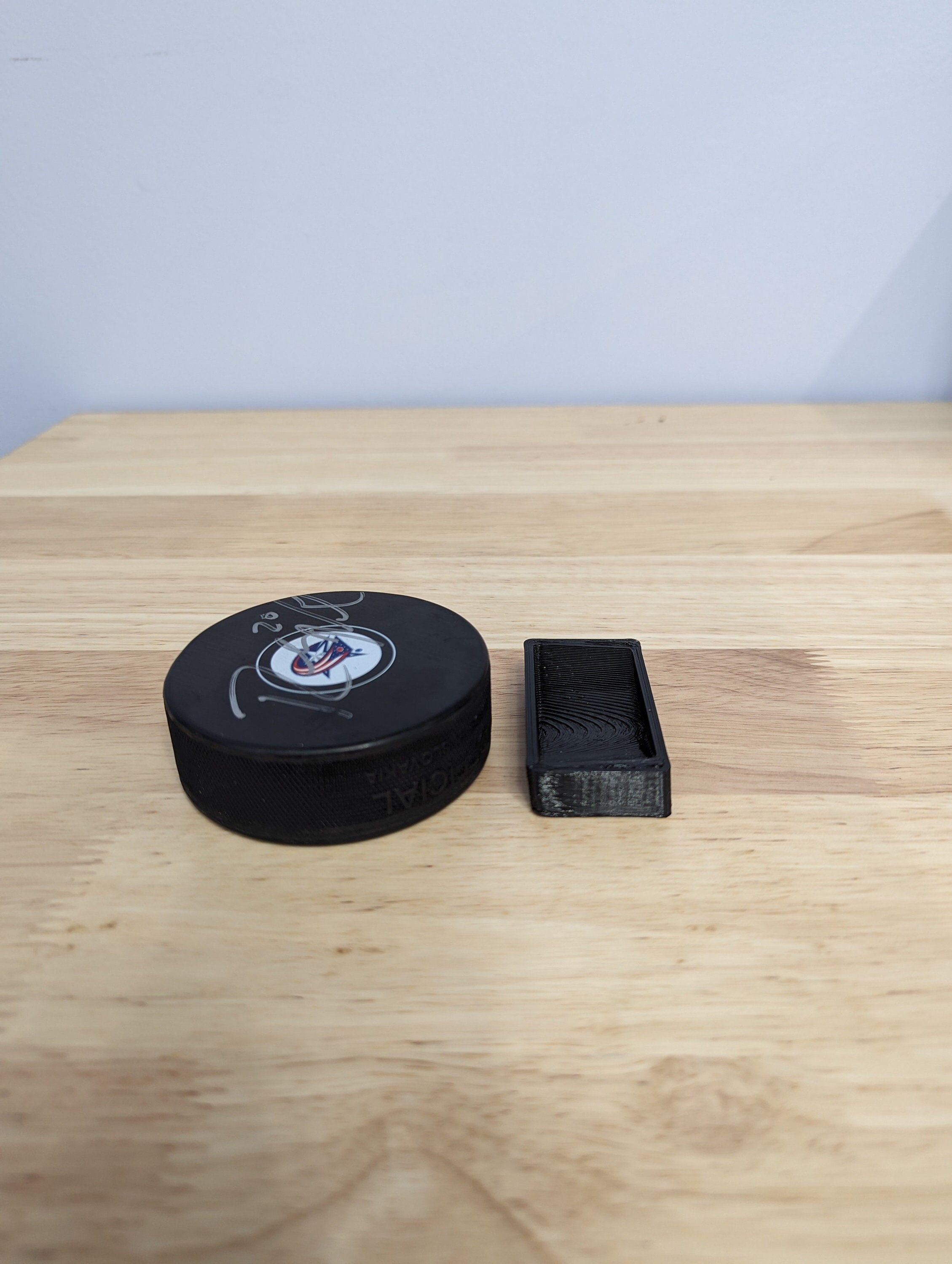 Hockey Puck Display Stand for Collectors and Sports Enthusiasts
