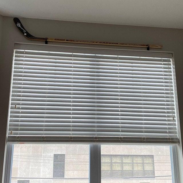 Hockey Skater Stick Wall Display Holder